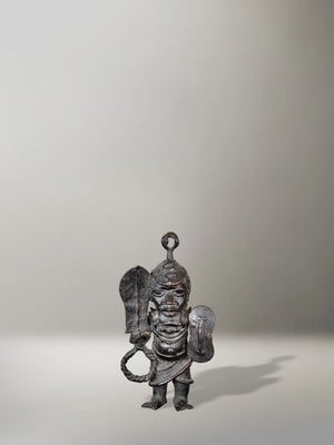 Escultura en bronce guerrero Benín